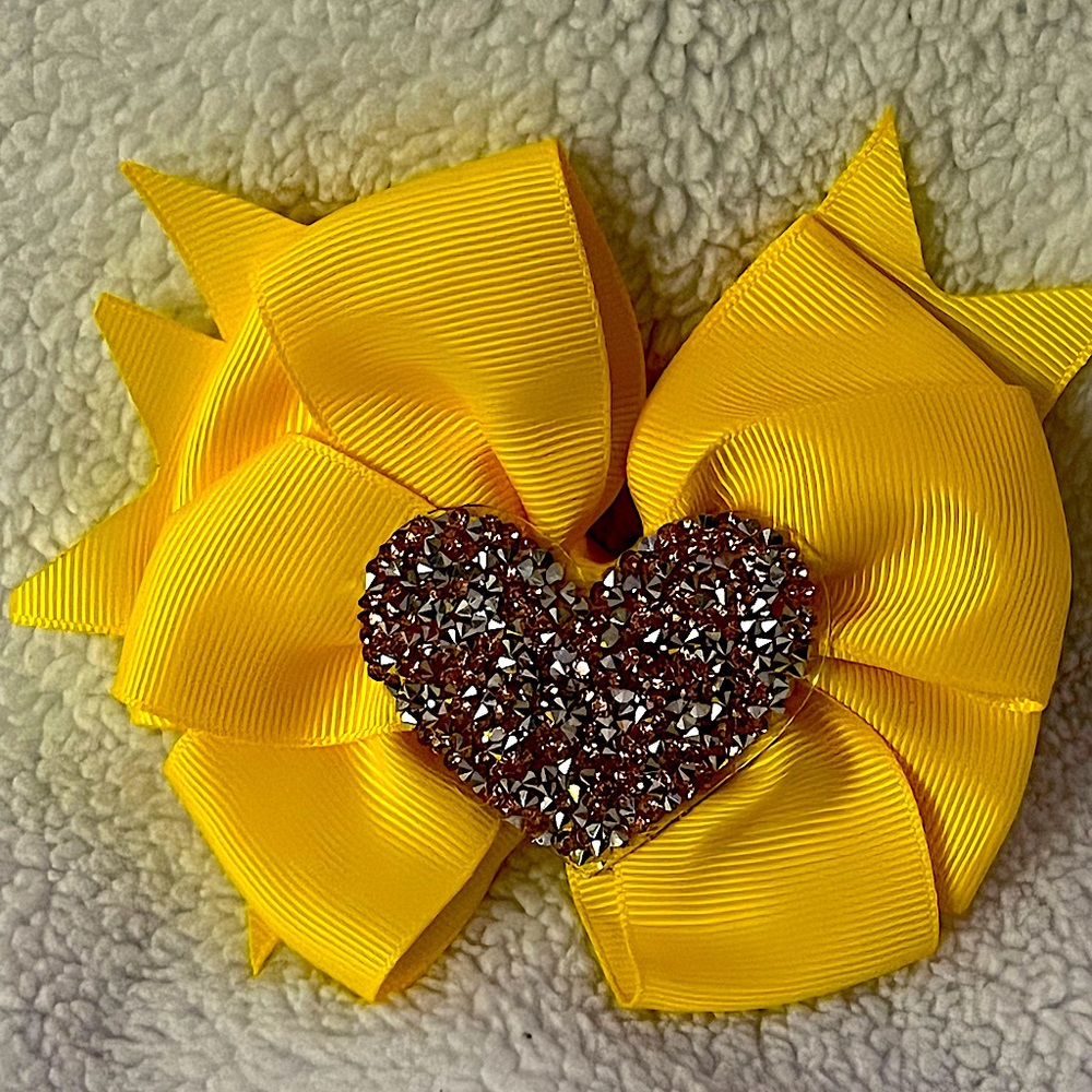 2 for $8 Yellow medium sized bow with heart